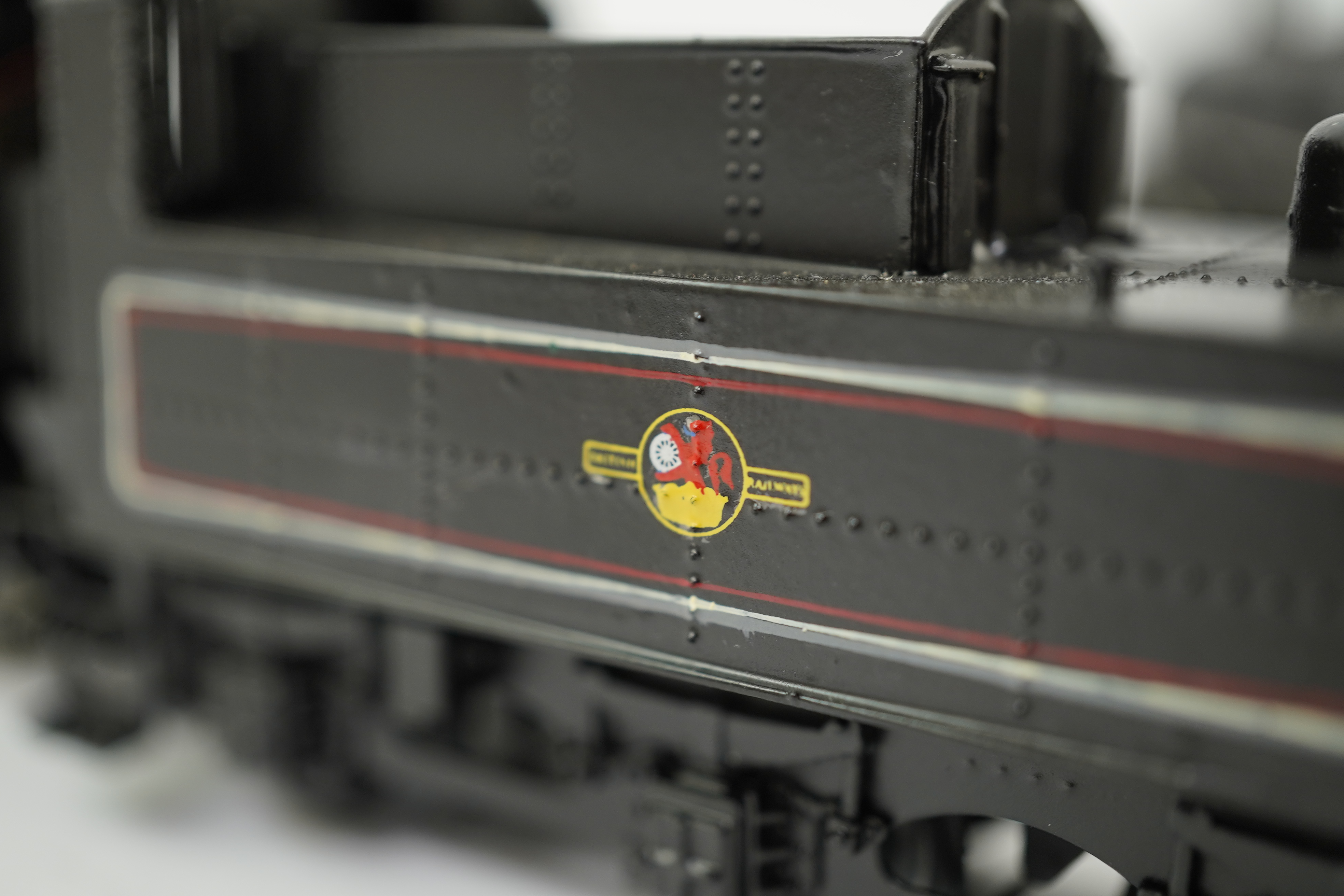 Two 00 gauge brass and white metal kit built BR tender locomotives; a Standard Class 2 2-6-0, 46437, together with a Standard Class 3 2-6-0, 77014, constructed, painted and lined to a high standard, both motored for two
